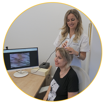 a trichologist performs treatment